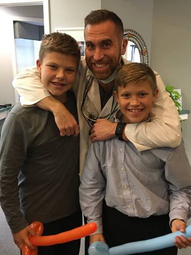 Dr. Witkoski with two boys